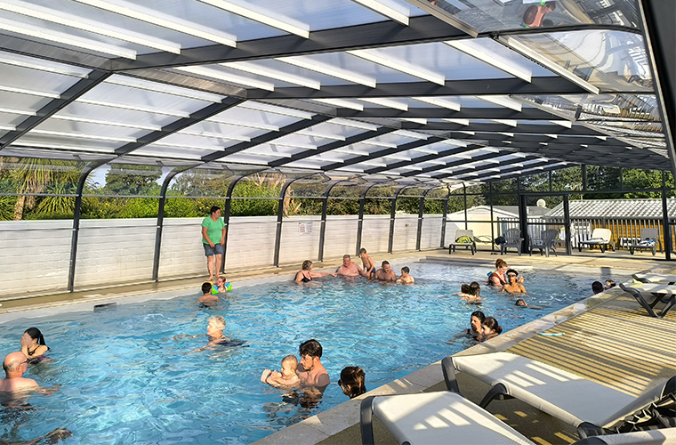View of the interior of the heated swimming pool at the Abri de l’Océan campsite in southern Brittany